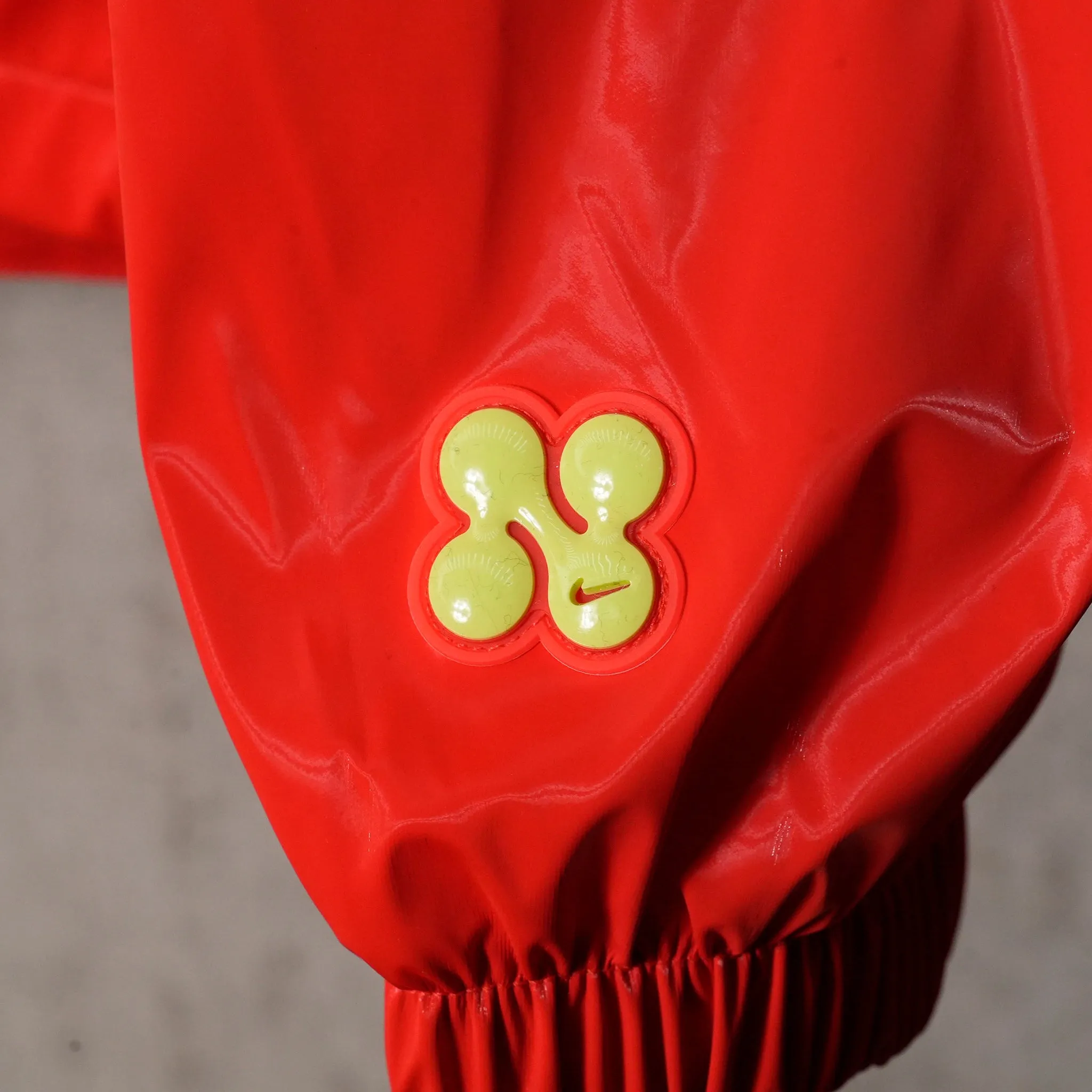 AS M NK PF TRACK JACKET / 696:LIGHT CRIMSON
